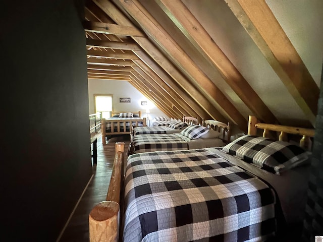 bedroom with lofted ceiling