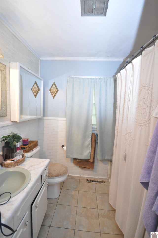 5770 Metropolis Lake Rd, West Paducah, KY 42086 - full bathroom with visible vents, tile patterned flooring, vanity, toilet, and ornamental molding