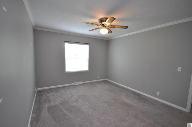 5770 Metropolis Lake Rd, West Paducah, KY 42086 - empty room with crown molding, visible vents, baseboards, a ceiling fan, and carpet