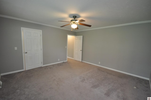 5770 Metropolis Lake Rd, West Paducah, KY 42086 - unfurnished bedroom with ceiling fan, baseboards, ornamental molding, and carpet floors