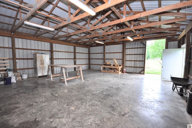 5770 Metropolis Lake Rd, West Paducah, KY 42086 - garage with freestanding refrigerator and metal wall
