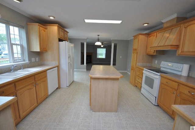 5770 Metropolis Lake Rd, West Paducah, KY 42086 - kitchen with a ceiling fan, a center island, a sink, premium range hood, and white appliances