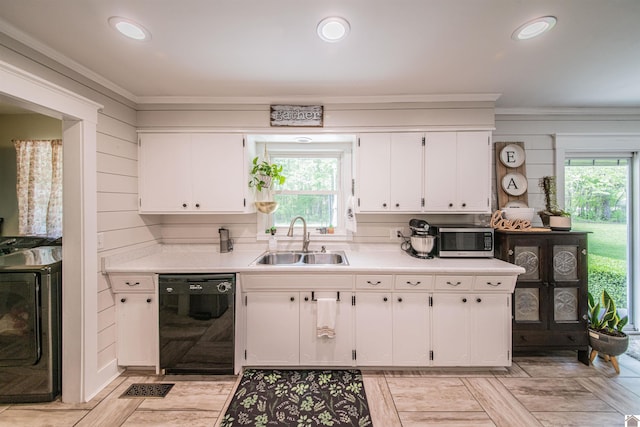 899 Fairview St, Benton, KY 42025 - kitchen featuring stainless steel microwave, a sink, black dishwasher, light countertops, and white cabinets