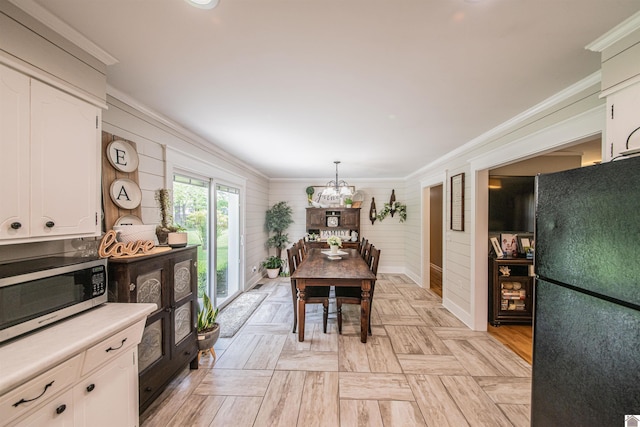 899 Fairview St, Benton, KY 42025 - dining area featuring ornamental molding and a notable chandelier