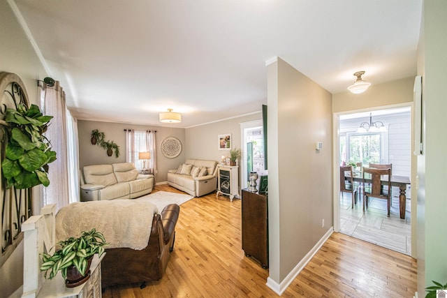 899 Fairview St, Benton, KY 42025 - living room with baseboards, light wood finished floors, and plenty of natural light