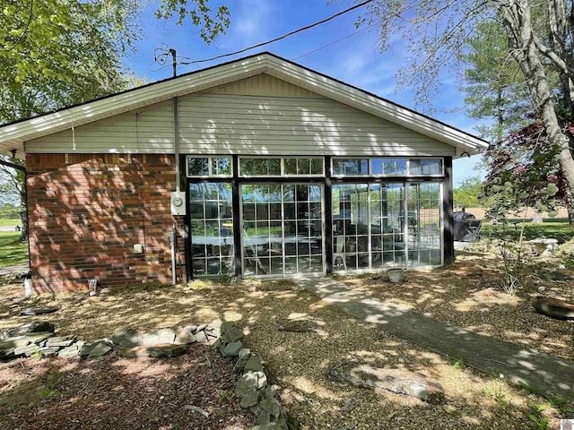 11189 E State Route 94, Murray, KY 42071 - back of property featuring brick siding and a sunroom