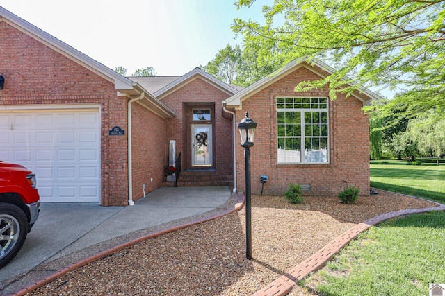 ranch-style house featuring a front lawn, a garage, and brick siding