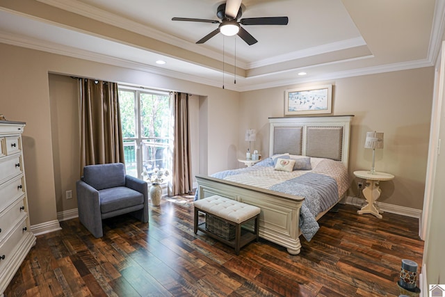 bedroom with a raised ceiling, baseboards, recessed lighting, ornamental molding, and dark wood-type flooring