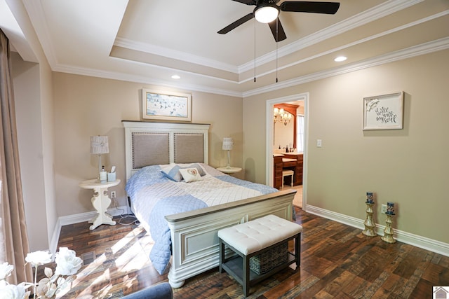 bedroom featuring dark wood-style floors, recessed lighting, a raised ceiling, crown molding, and baseboards
