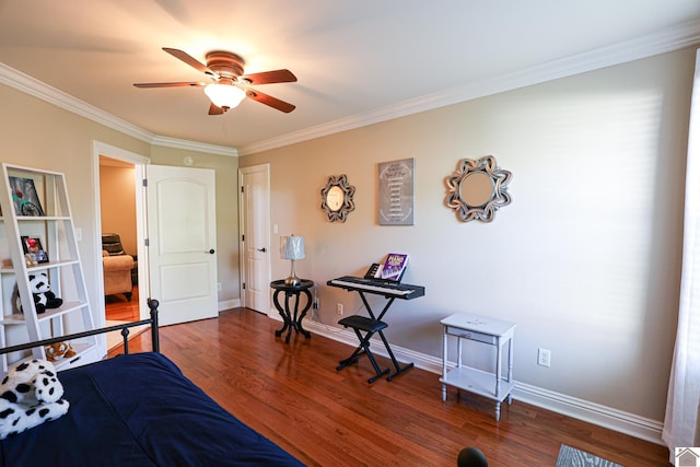 bedroom featuring wood finished floors, crown molding, a ceiling fan, and baseboards