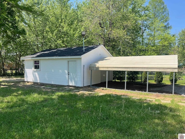 view of outbuilding featuring an outbuilding and a carport