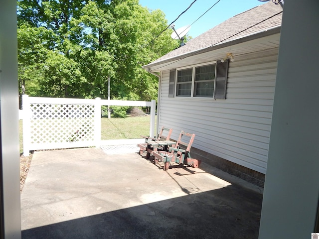 view of patio with fence