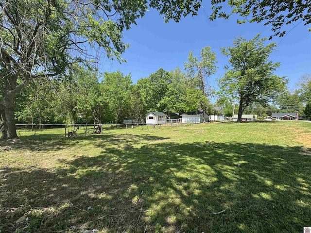 view of yard featuring fence