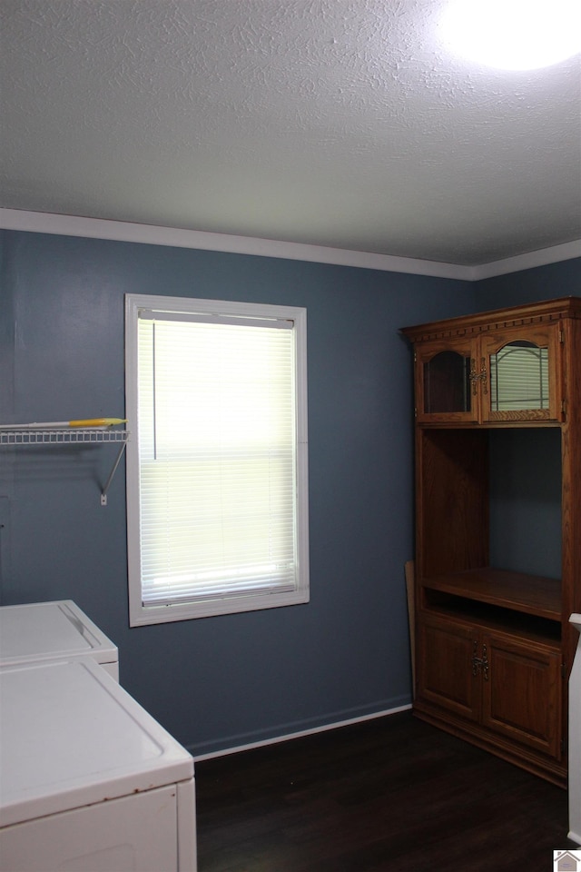 1725 Evelyn Dr, Paducah, KY 42003 - laundry room featuring separate washer and dryer, dark wood finished floors, a textured ceiling, and baseboards