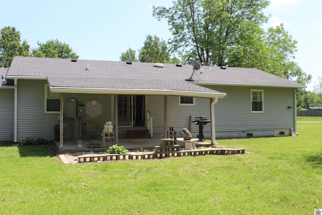 1725 Evelyn Dr, Paducah, KY 42003 - rear view of house featuring a patio, a yard, and a shingled roof