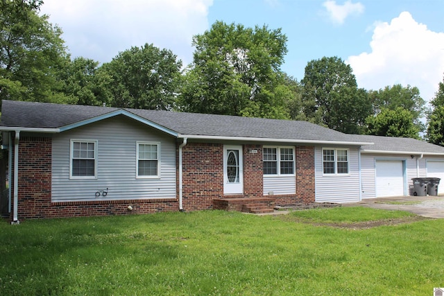 1725 Evelyn Dr, Paducah, KY 42003 - single story home with a garage, a front yard, brick siding, and concrete driveway