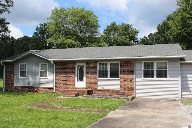 1725 Evelyn Dr, Paducah, KY 42003 - ranch-style house featuring entry steps, brick siding, a front yard, and roof with shingles