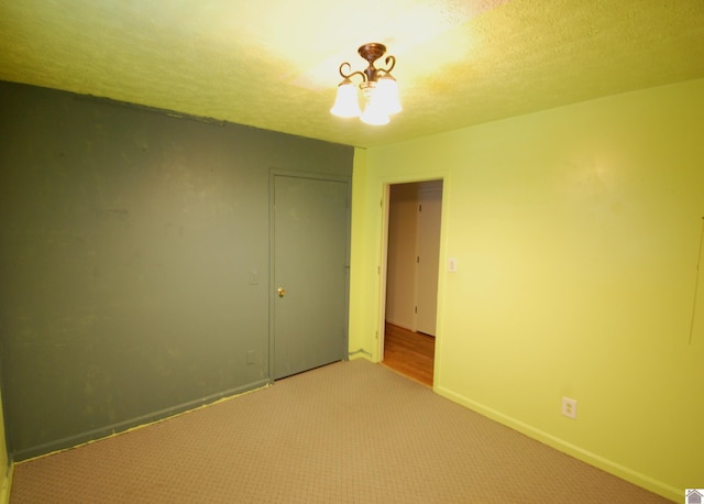 unfurnished room featuring carpet