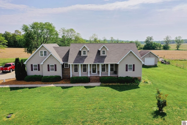 cape cod house with a garage, a porch, and a front yard