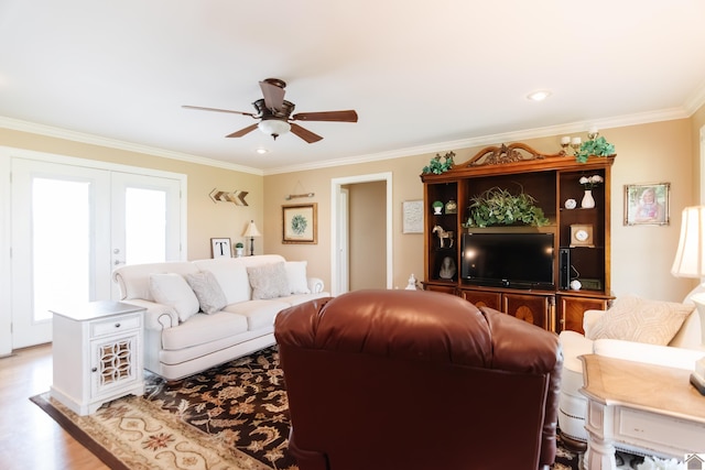 living room featuring crown molding, wood finished floors, ceiling fan, recessed lighting, and french doors