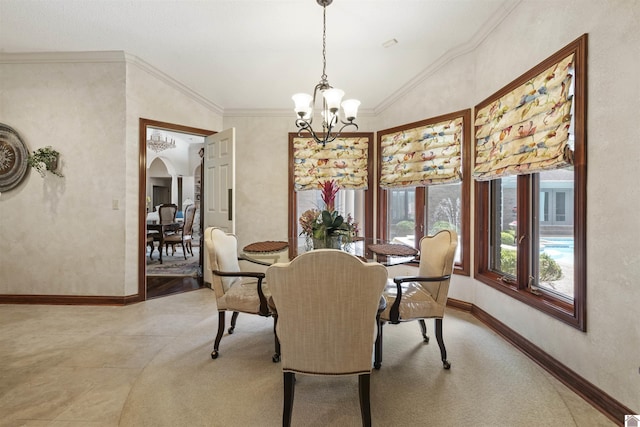 dining space featuring arched walkways, baseboards, lofted ceiling, and a chandelier
