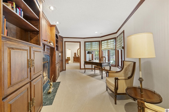 sitting room with crown molding, recessed lighting, baseboards, and light carpet