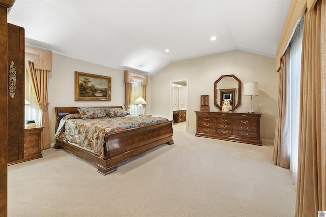 carpeted bedroom featuring recessed lighting, baseboards, ensuite bathroom, and lofted ceiling