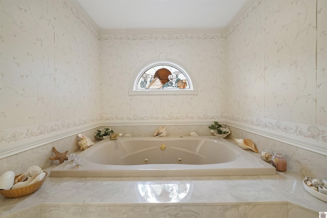 bathroom with a jetted tub and wallpapered walls