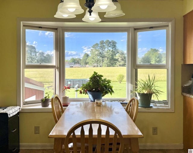 3458 Palma Rd, Calvert City, KY 42029 - dining area with healthy amount of natural light and baseboards