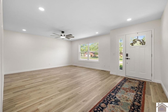 entryway with light wood-type flooring, recessed lighting, baseboards, and ceiling fan