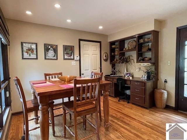 dining room with recessed lighting and light wood-style flooring