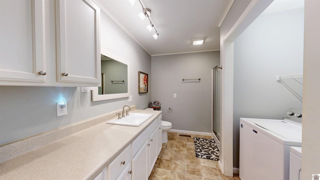 608 E 12th St, Benton, KY 42025 - full bath featuring visible vents, a stall shower, vanity, toilet, and separate washer and dryer