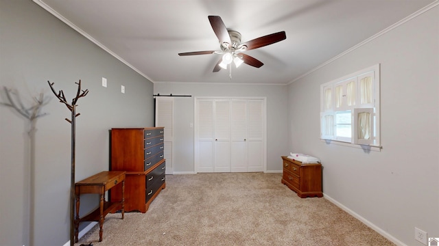 608 E 12th St, Benton, KY 42025 - unfurnished bedroom with carpet flooring, ceiling fan, baseboards, ornamental molding, and a closet