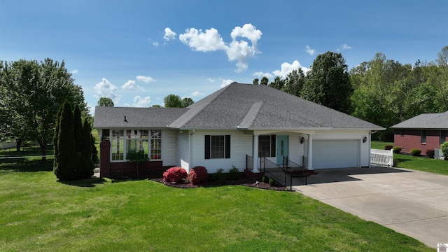 single story home with a garage, a front lawn, roof with shingles, and driveway