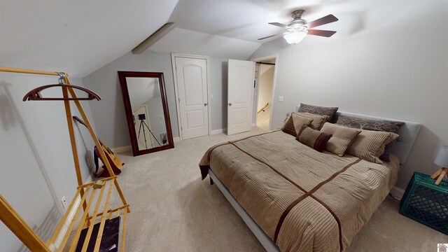 bedroom with a ceiling fan, baseboards, light colored carpet, and lofted ceiling