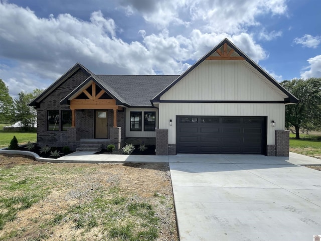 1360 Eagle Ln, Mayfield, KY 42066 - craftsman-style home featuring concrete driveway, brick siding, roof with shingles, and a garage