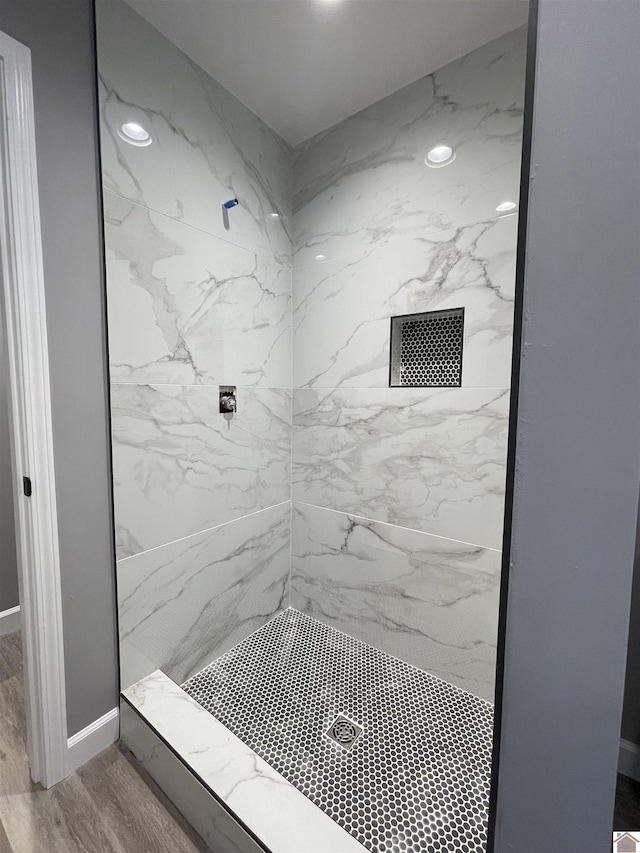 1360 Eagle Ln, Mayfield, KY 42066 - bathroom featuring walk in shower and wood finished floors