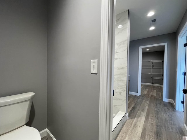 1360 Eagle Ln, Mayfield, KY 42066 - bathroom with baseboards, toilet, wood finished floors, and visible vents