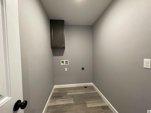1360 Eagle Ln, Mayfield, KY 42066 - washroom with hookup for an electric dryer, cabinet space, wood finished floors, baseboards, and hookup for a washing machine