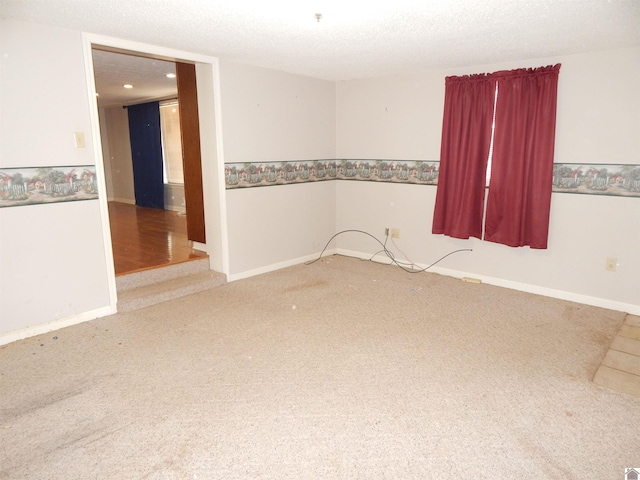 2286 Murray Hwy, Benton, KY 42025 - carpeted spare room with a textured ceiling and baseboards