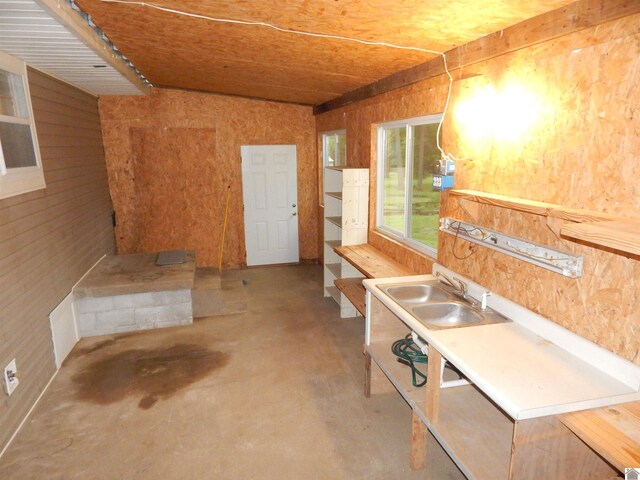 2286 Murray Hwy, Benton, KY 42025 - interior space with concrete flooring and wooden walls