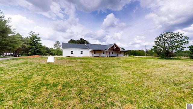 exterior space featuring a front lawn