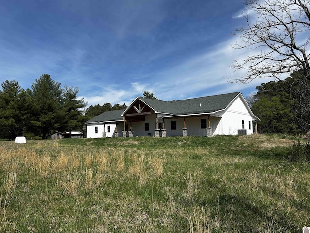 view of front of house featuring cooling unit