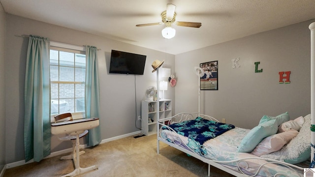 486 Mermie, Hardin, KY 42048 - bedroom with baseboards, light carpet, and a ceiling fan