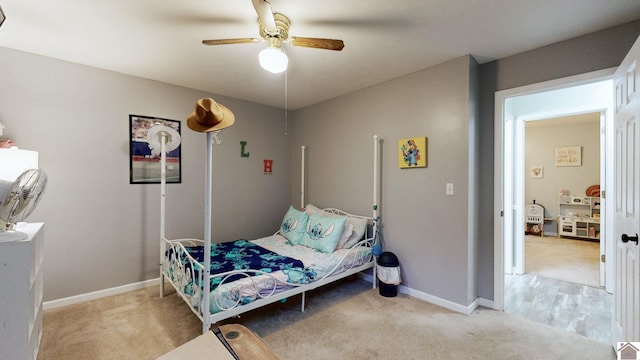 486 Mermie, Hardin, KY 42048 - bedroom featuring baseboards, ceiling fan, and light colored carpet