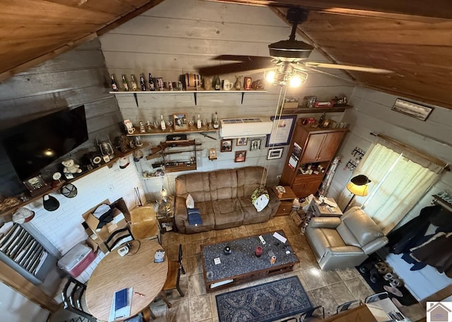 198 Mandor Rd, Hardin, KY 42048 - living room featuring vaulted ceiling, tile patterned floors, wooden walls, and a ceiling fan
