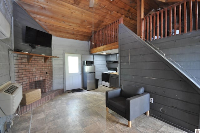 198 Mandor Rd, Hardin, KY 42048 - interior space featuring vaulted ceiling, a fireplace, wooden walls, and wood ceiling