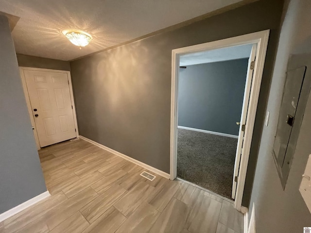 429 S 2nd St, Mayfield, KY 42066 - interior space with wood finished floors, visible vents, and baseboards