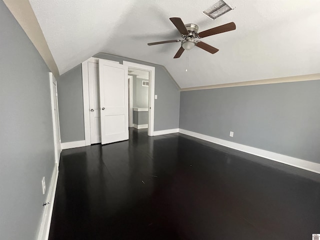 429 S 2nd St, Mayfield, KY 42066 - bonus room featuring vaulted ceiling, ceiling fan, baseboards, and dark wood-type flooring