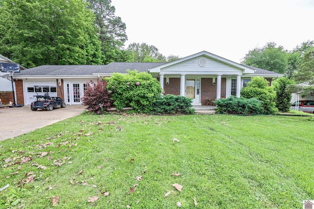 view of front facade featuring a garage, a front lawn, concrete driveway, a porch, and brick siding
